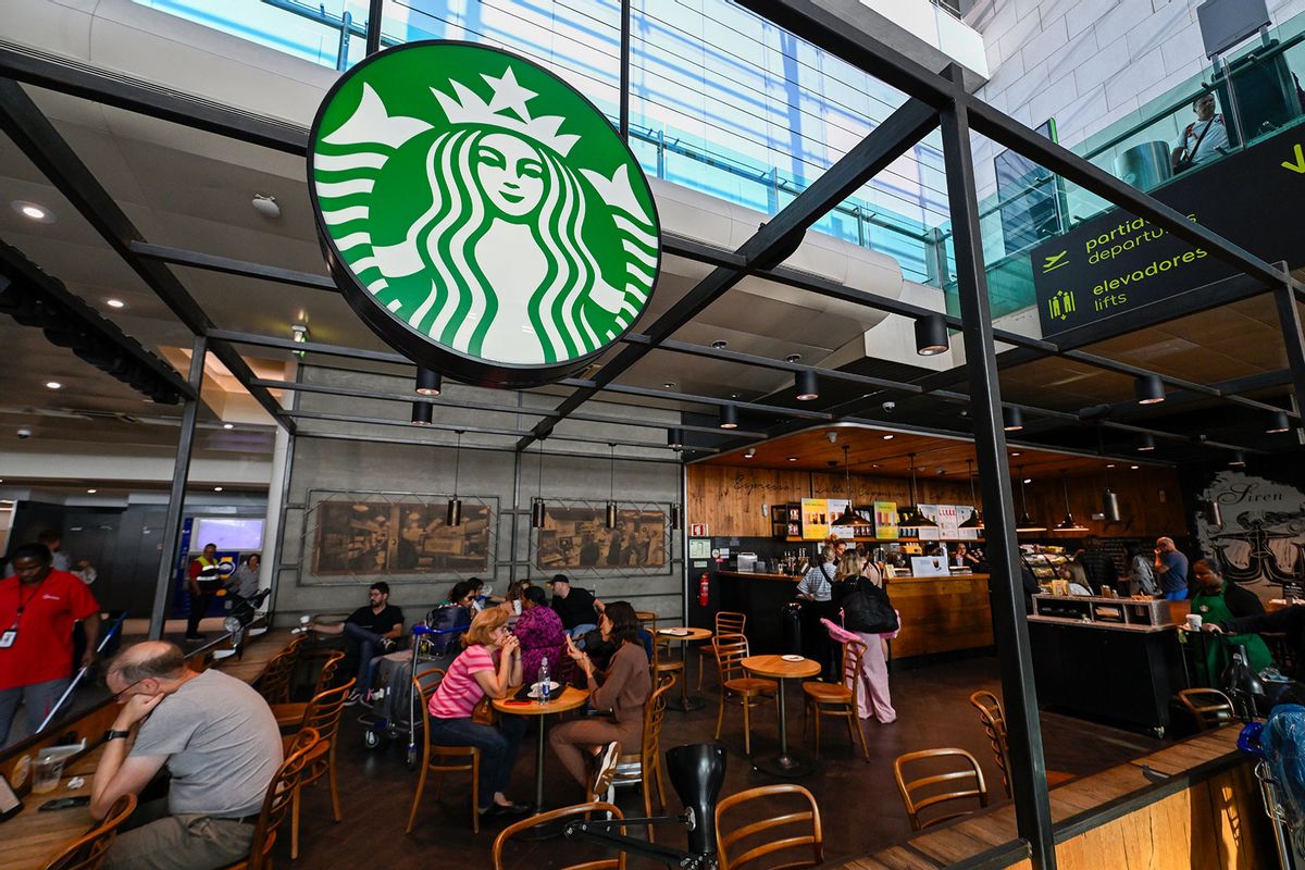 Patrons sit at Starbucks Coffee in Terminal 1 Arrivals Hall at Humberto Delgado International Airport on August 02, 2024, in Lisbon, Portugal. (Horacio Villalobos - Corbis/Corbis via Getty Images)