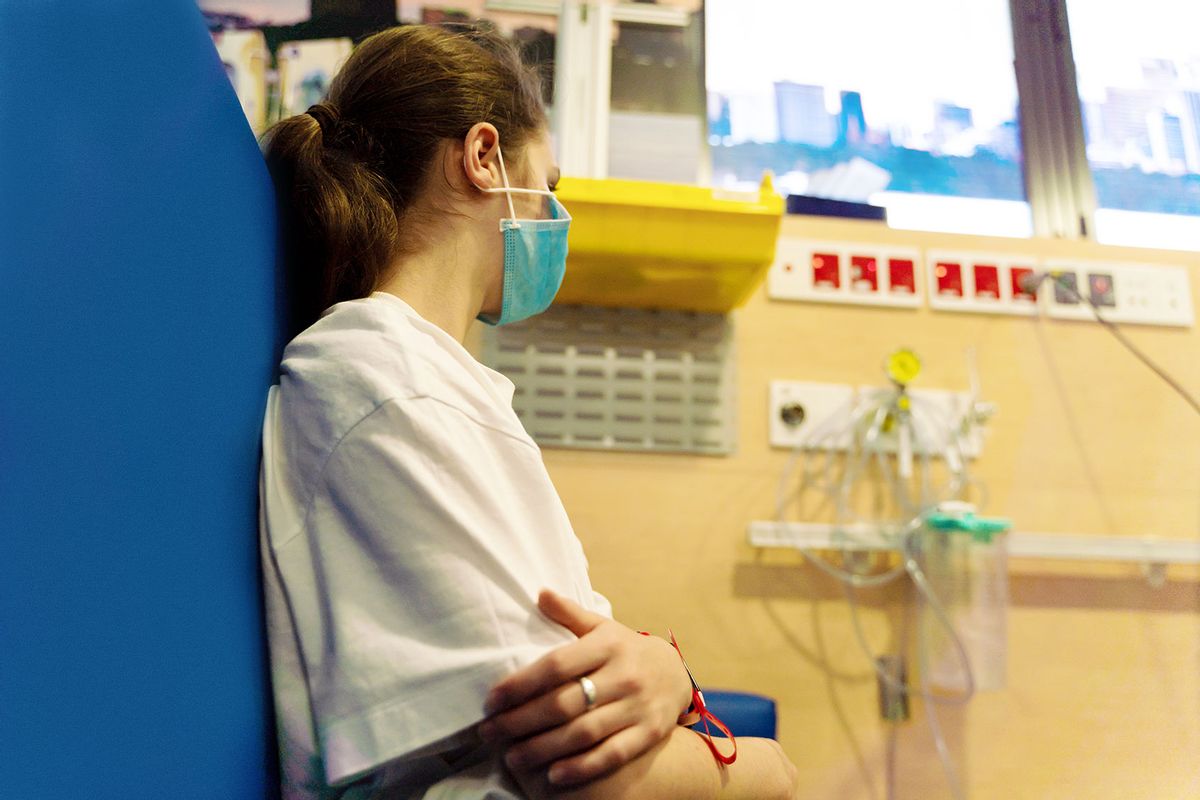 A young girl is waiting for a doctor in a waiting room at the Hospital (Getty Images/Julia Gomina)